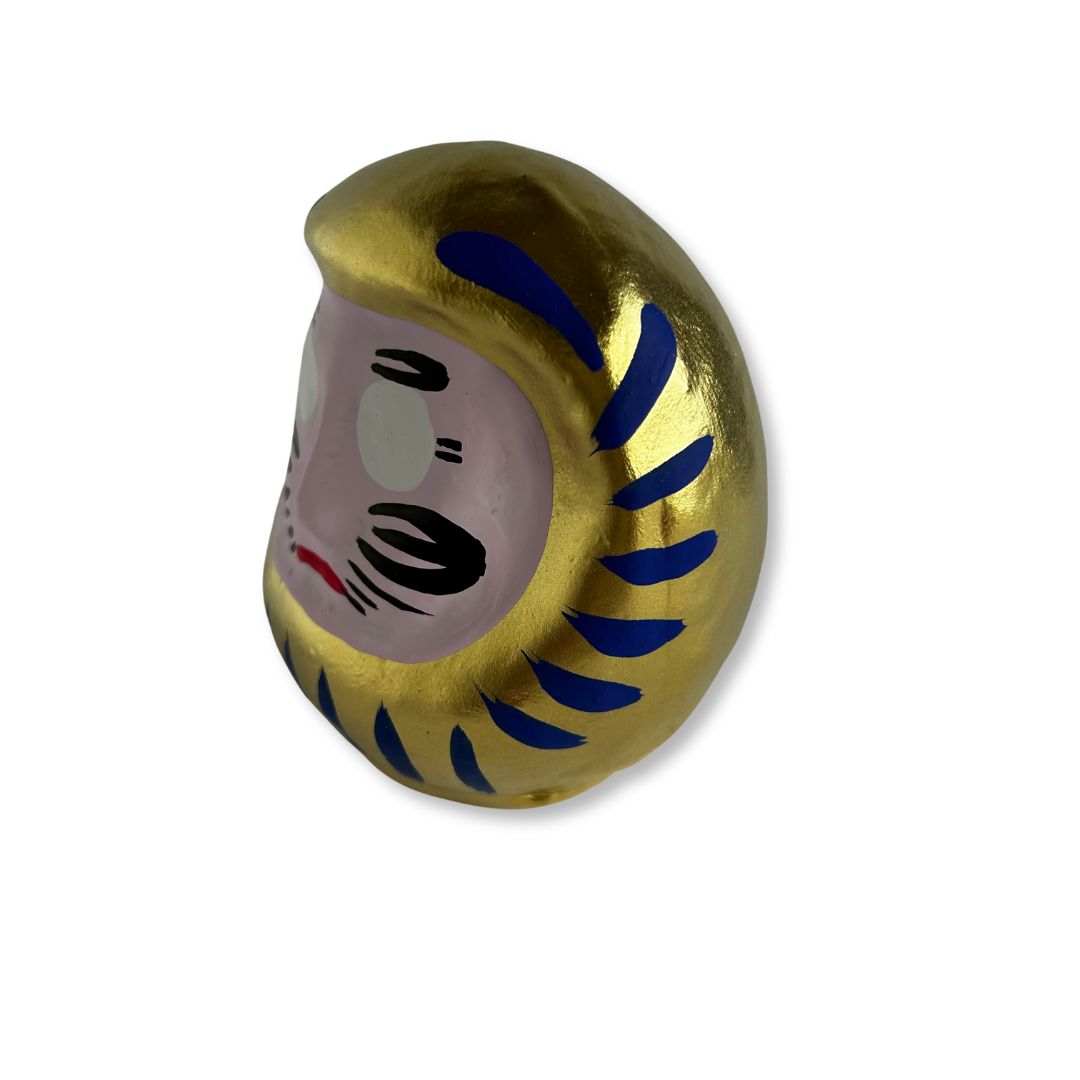 bereik je doelen met dit Daruma Gelukspoppetje Goud 9cm