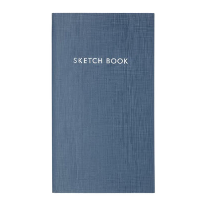 Kokuyo Sketch Book met minimalistische Japanse kaft, compact formaat en geruite pagina’s voor tekenen en notities.